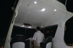 Hella 0500 Series Slim Line White 12V DC Round Soft LED Courtesy Light W/ White Plastic Rim