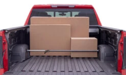 Lund Universal Ratcheting Cargo Bar - Black -Esptruck Shop 7f02ae989705f3ef5e9502904477c0cb